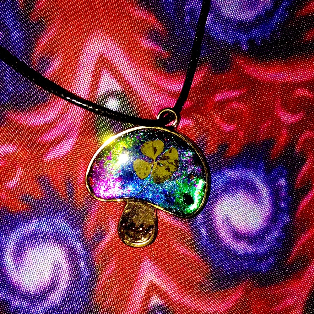 Gold bezel mushroom infused with reiki healing and crystals and 4 leaf clover